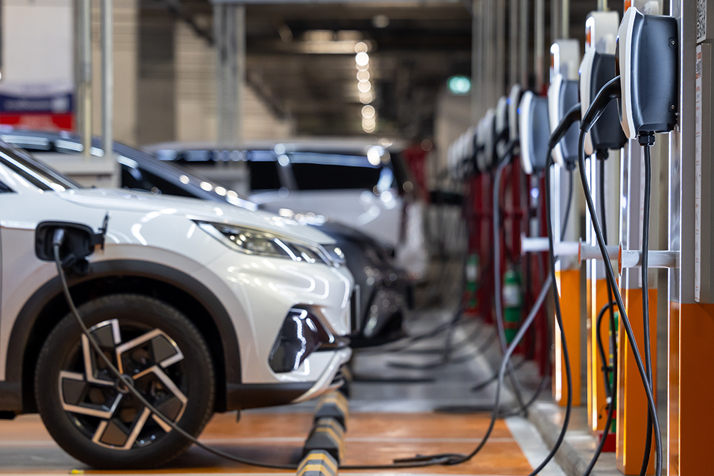 side view of front of charging car with station