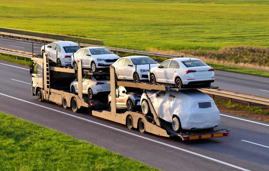 truck loaded with cars